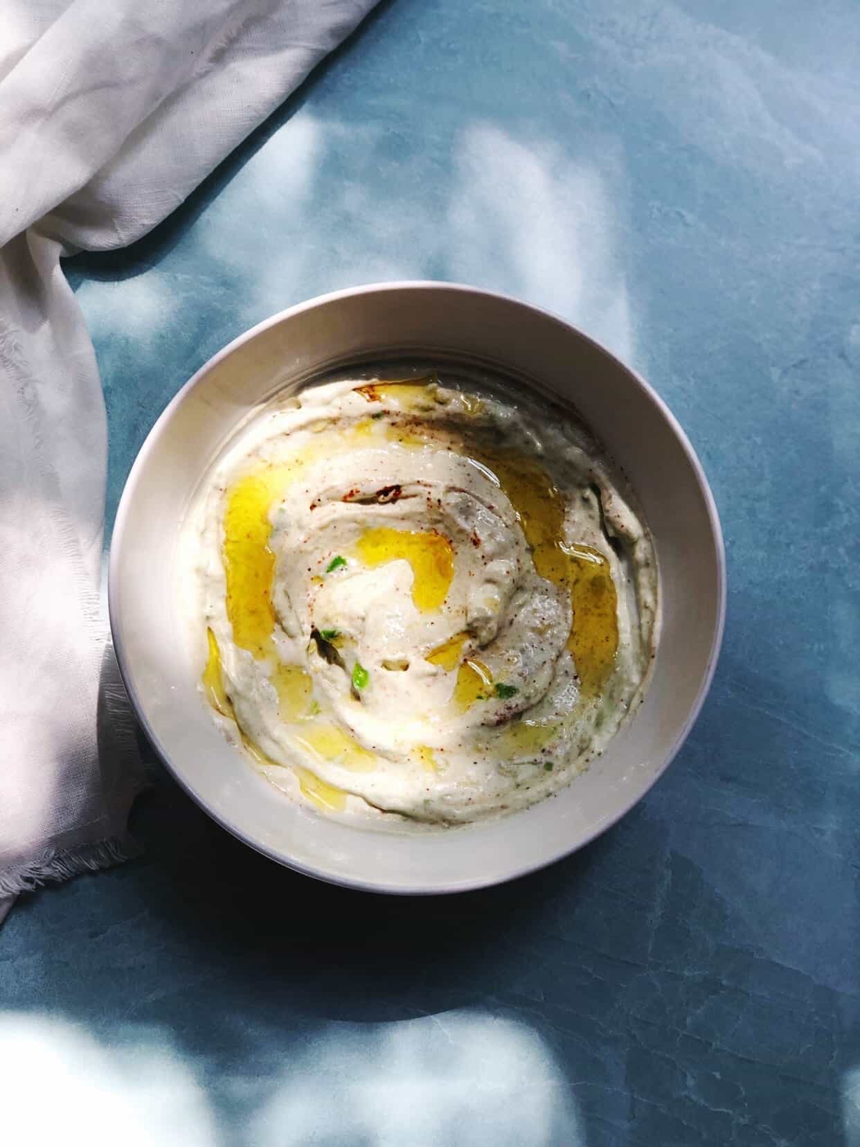 avocado-yogurt-dip Bowl of avocado greek yoghurt dip on a table