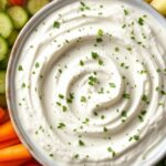 Bowl of greek yogurt ranch dip with veggie sticks