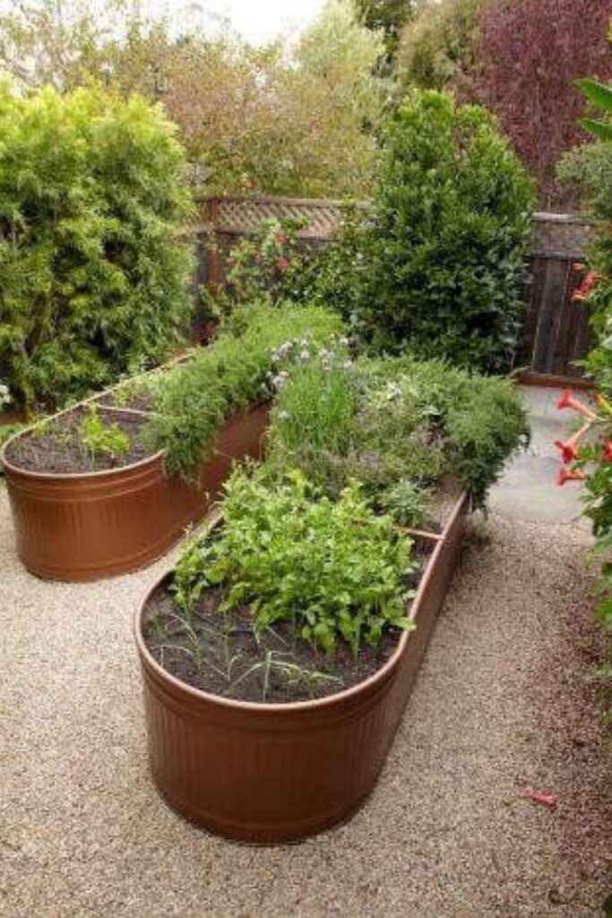 Metal through garden bed