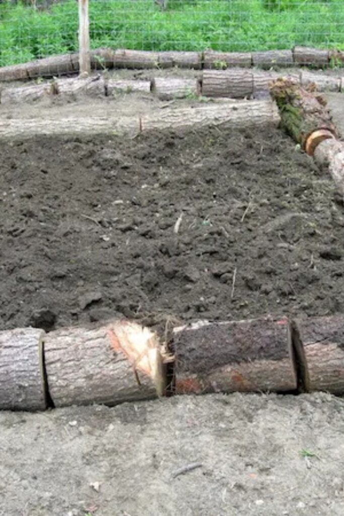Logs raised bed